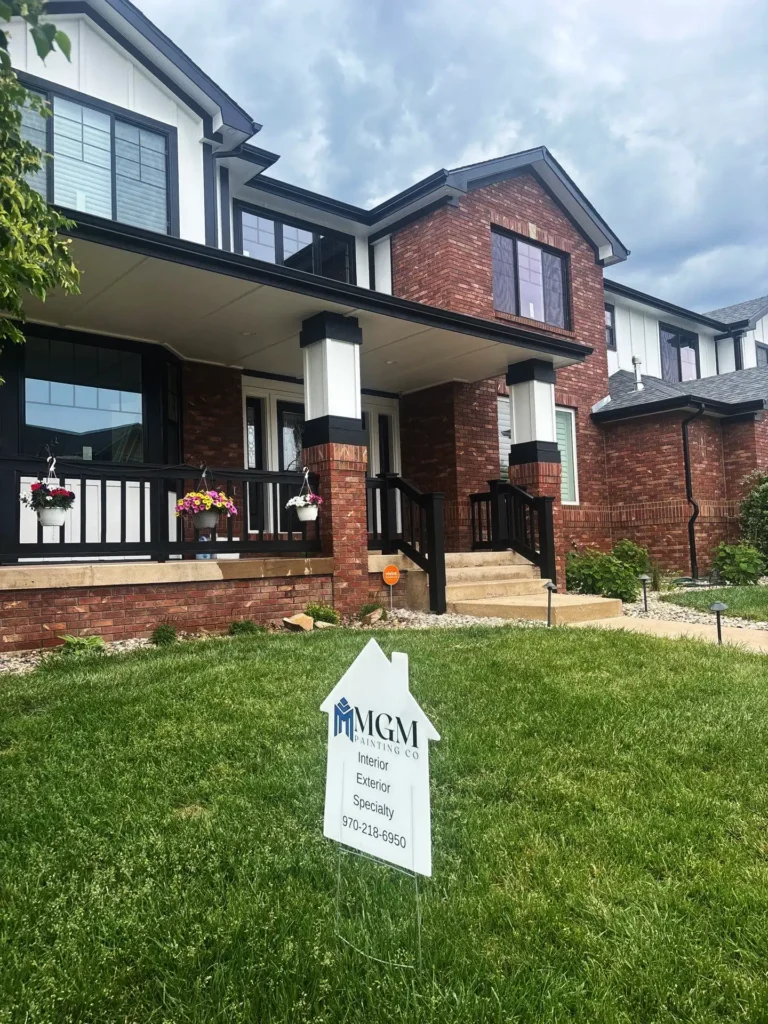 a house with a sign in front of it