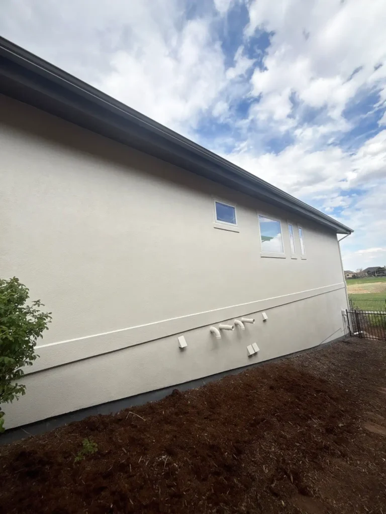 Residential Exterior Painting Project in Fort Collins Colorado by MGM Painting Co. The house has been professionally painted.